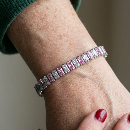 Tennisarmband met roze strepen in wit goud