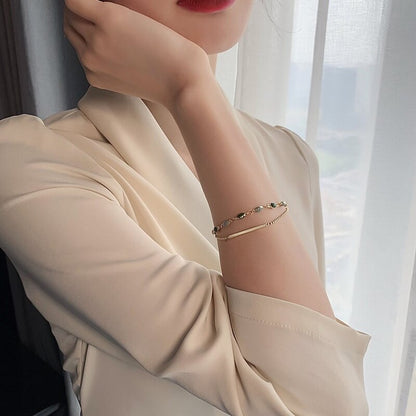 Dubbele armband Charis in goud