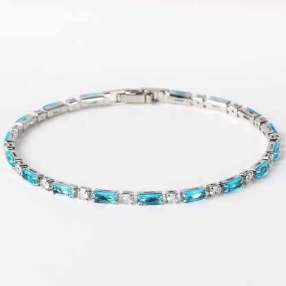 Armband met natuurlijke turquoise stenen in wit goud