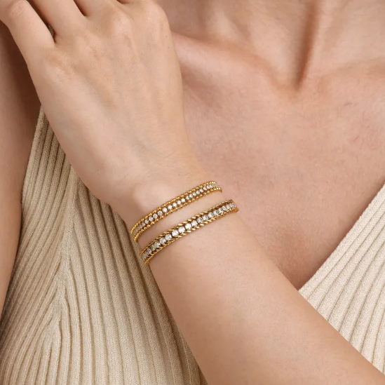 Roestvrijstalen armband met glinsterende schakels in goud