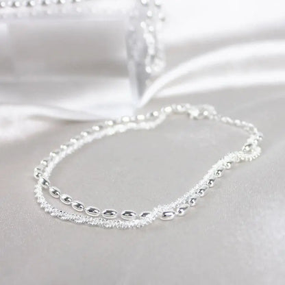 Armband met steentjes in wit goud