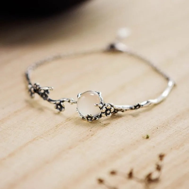 Retro armband met bloesemtak in wit goud