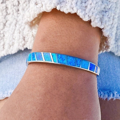 Blauw opalen armband in wit goud