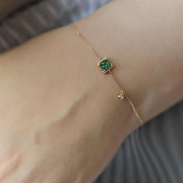 Armband met groen kristal in goud