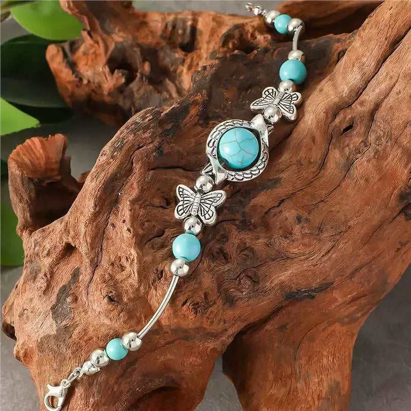 Vlinderarmband in wit goud