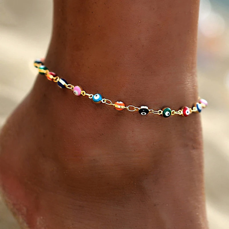 Kleurrijke armband met Grieks oog in goud