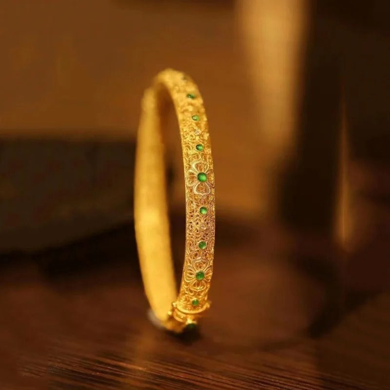 Bangle met edelstenen in goud