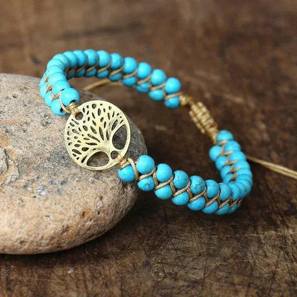 Handgemaakte turquoise levensboomarmband in goud