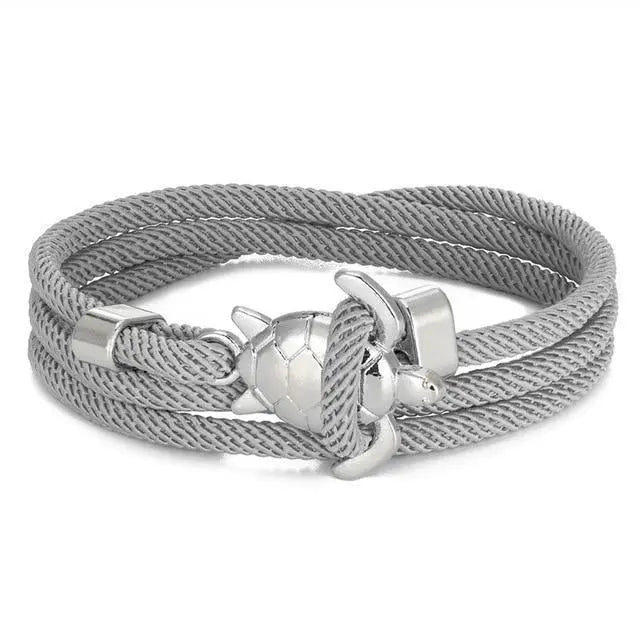 Handgemaakte armband met zeeschildpad in goud