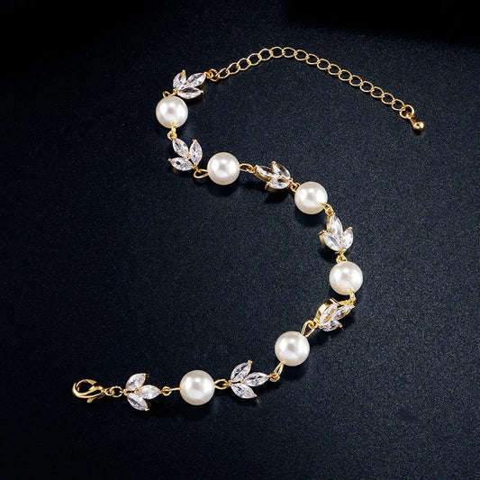 Retro armband met parels en blaadjes in goudkleur | Goud