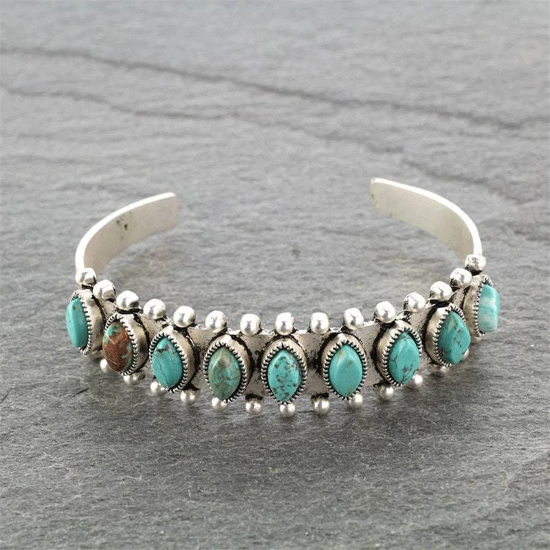 Retro armband met turquoise stenen in goud