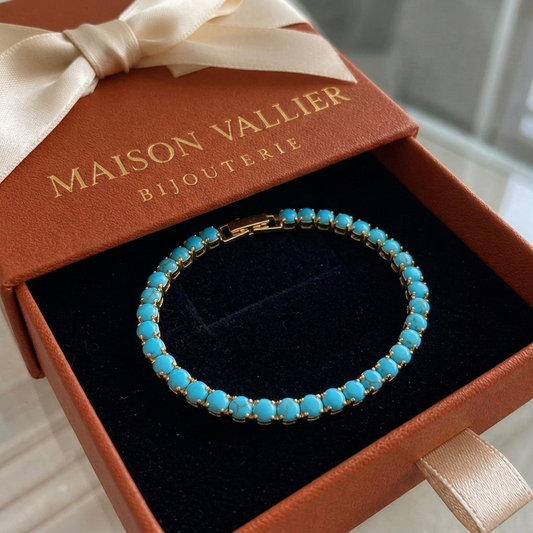 Ronde turquoise tennisarmband in goud
