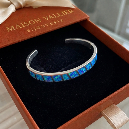 Blauw opalen armband in wit goud