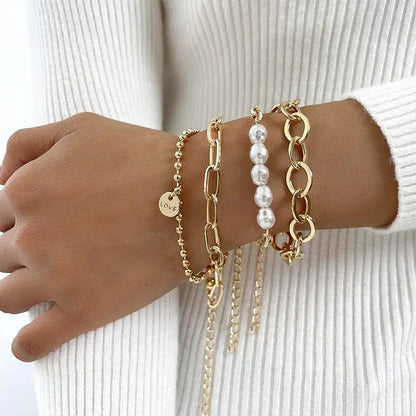 Armbanden met madeliefjes in goud