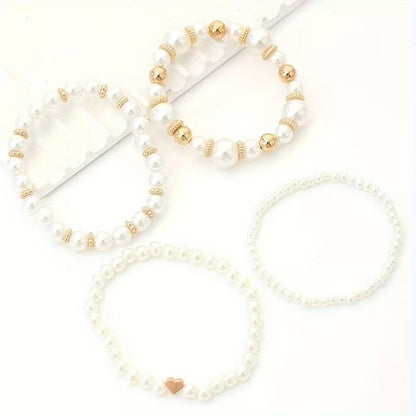 Armbanden met witte parels | Goud