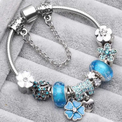 Retro blauwe armbanden in wit goud
