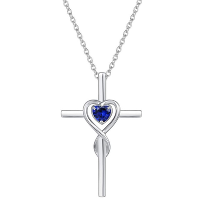 Kruisketting met saffieren hartsteen in wit goud