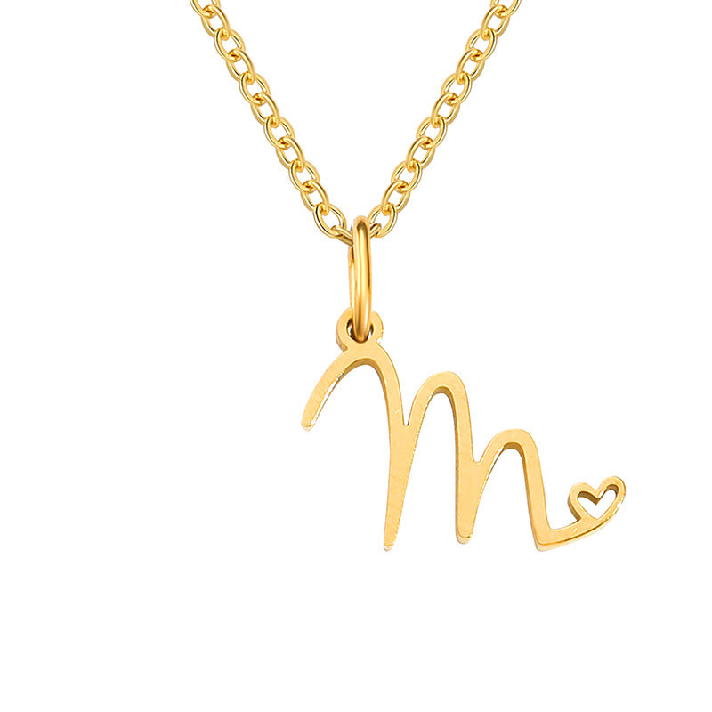 Initialenketting met hart in goud