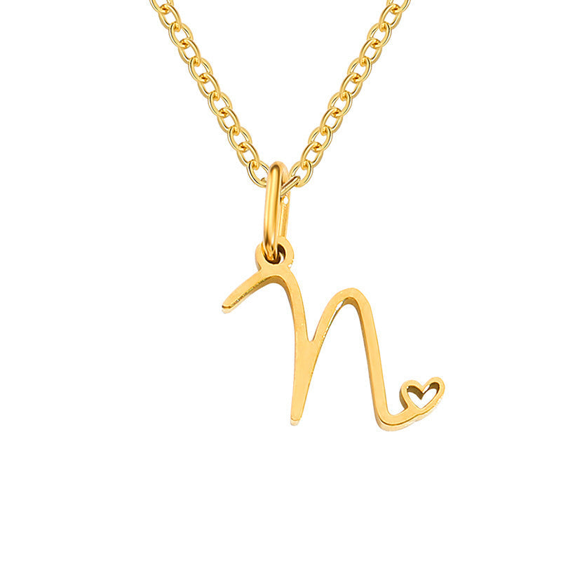 Initialenketting met hart in goud