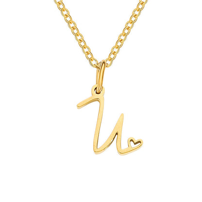 Initialenketting met hart in goud