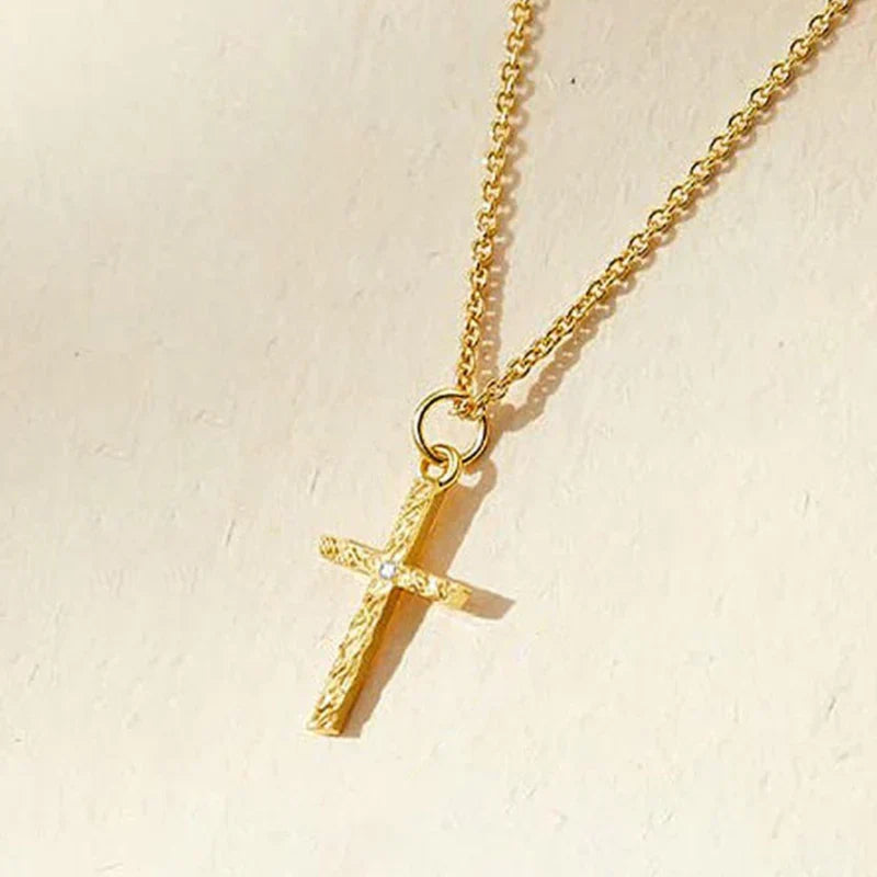 Gekruiste initialenketting in goud