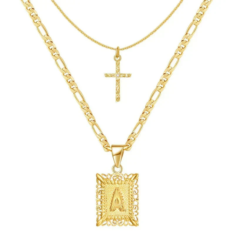 Gekruiste initialenketting in goud