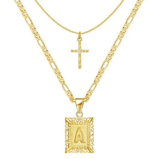 Gekruiste initialenketting in goud