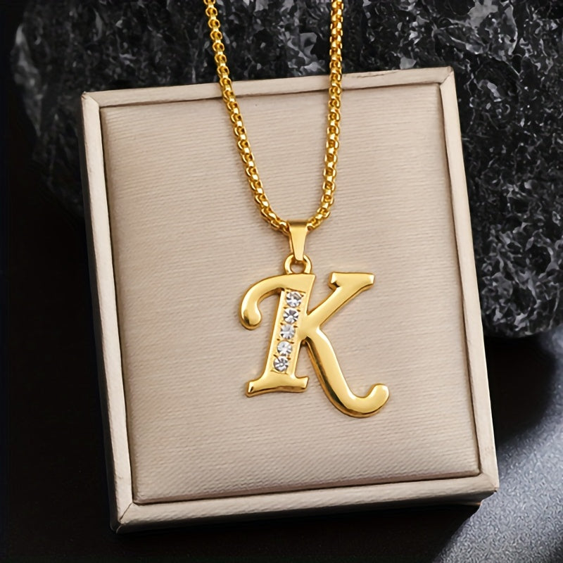 Initialenketting met kristallen accent in goud
