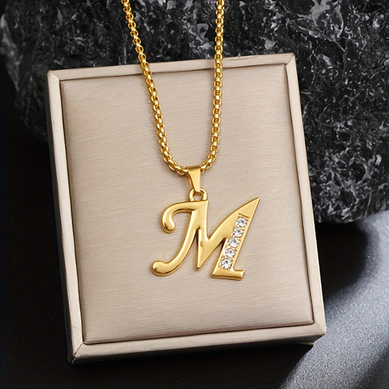 Initialenketting met kristallen accent in goud