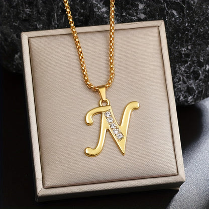 Initialenketting met kristallen accent in goud