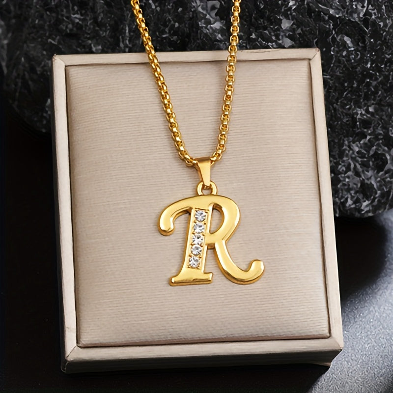 Initialenketting met kristallen accent in goud