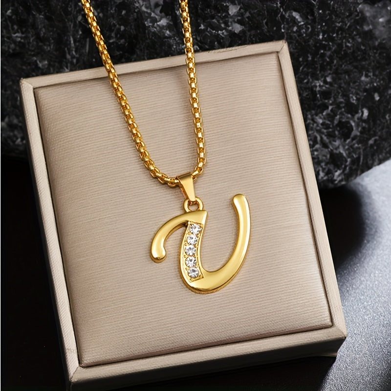 Initialenketting met kristallen accent in goud