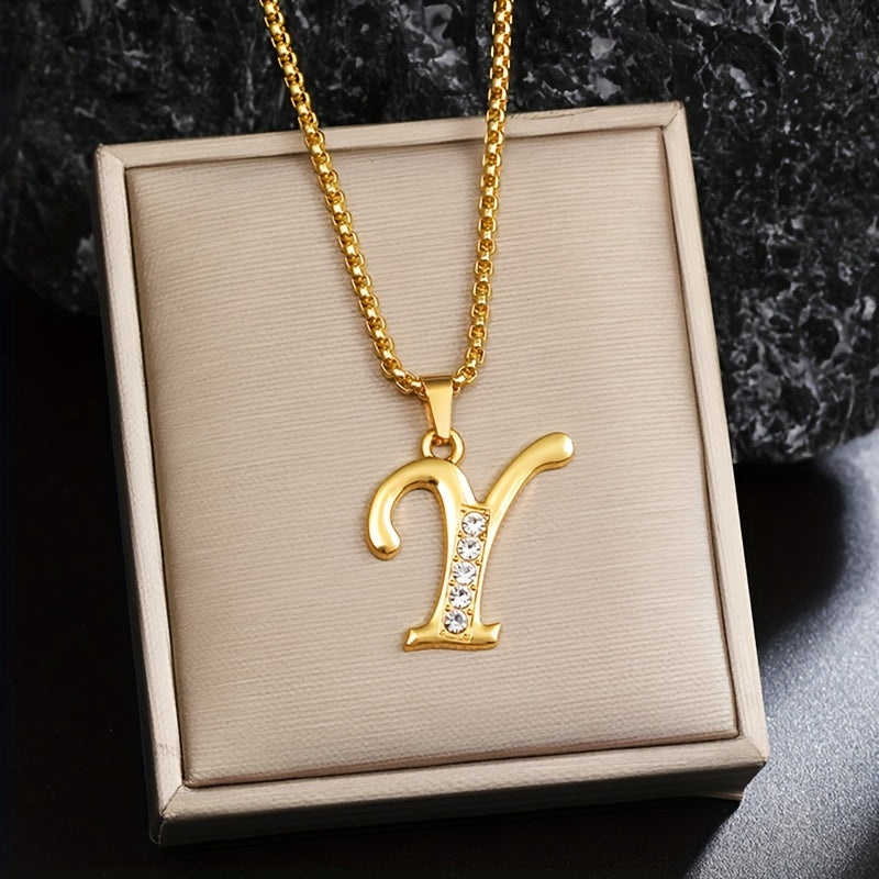 Initialenketting met kristallen accent in goud