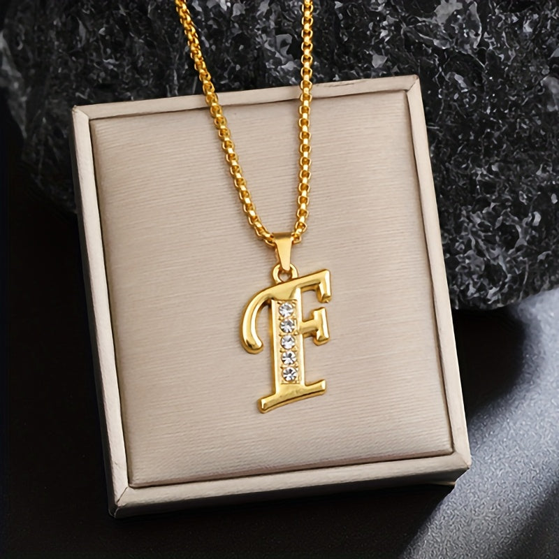 Initialenketting met kristallen accent in goud