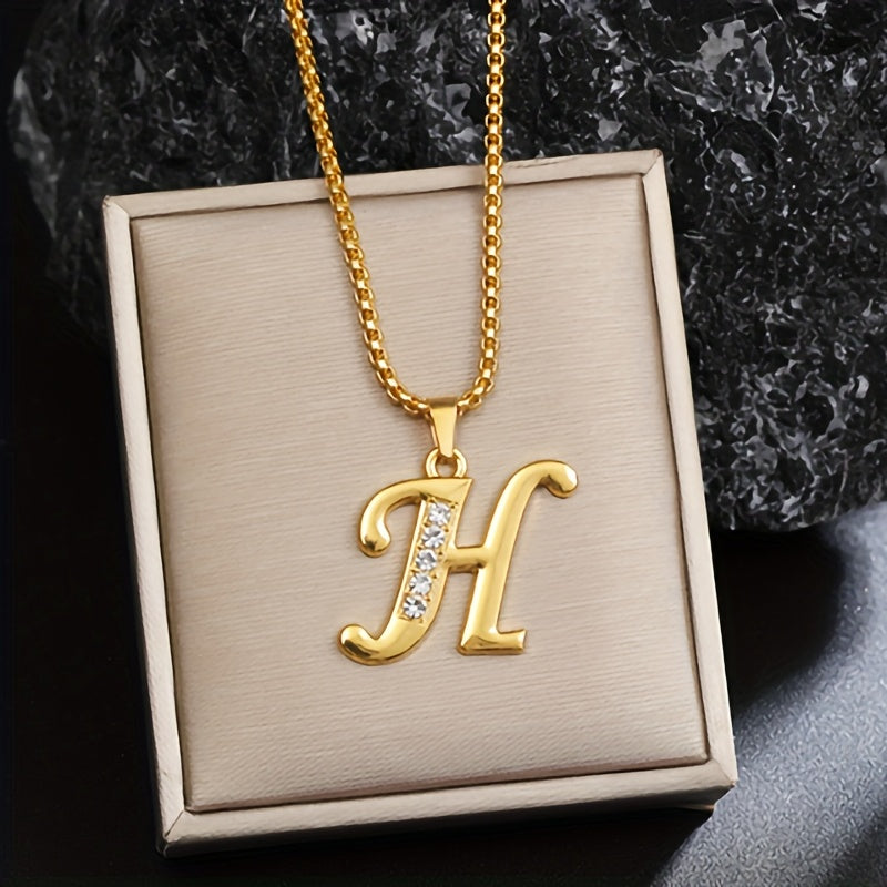Initialenketting met kristallen accent in goud