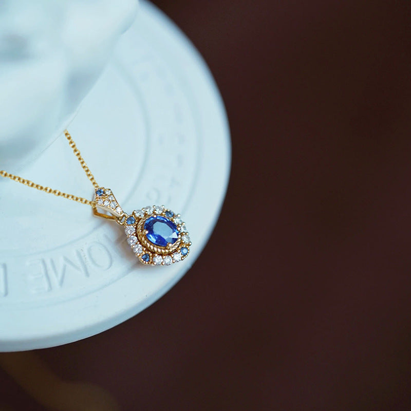 Koninklijke hemelse hangerketting in goud