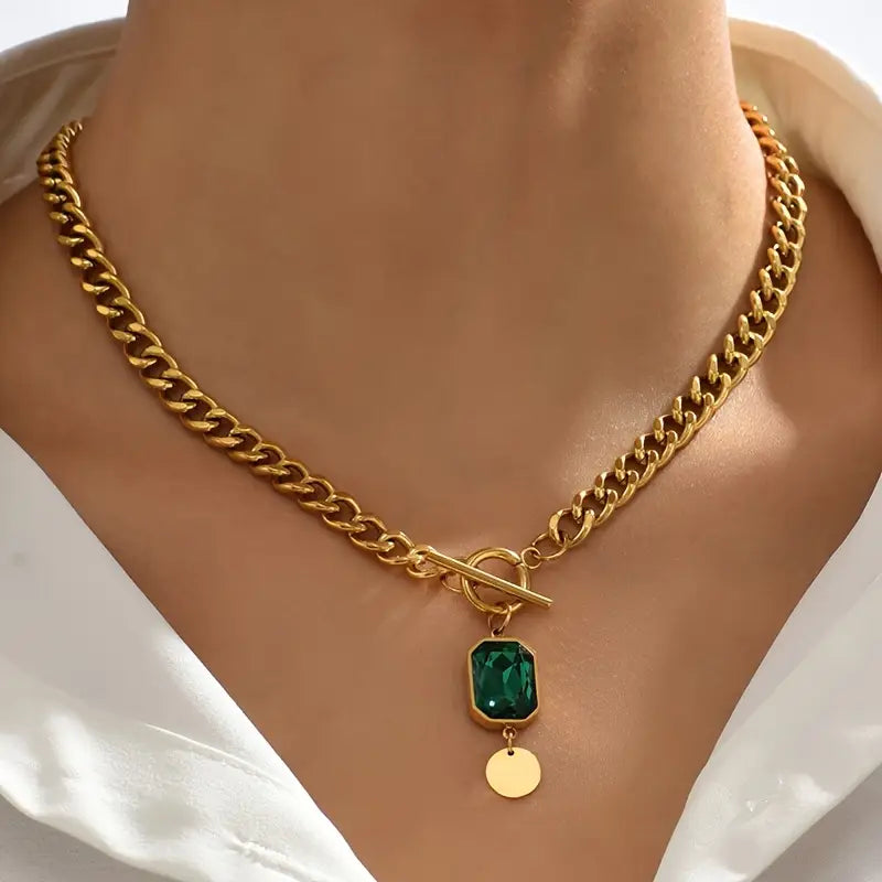 Dikke smaragd hangerketting in goud