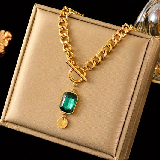Dikke smaragd hangerketting in goud