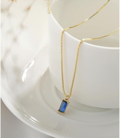 Minimalistische hangerketting met saffier | Witgoud