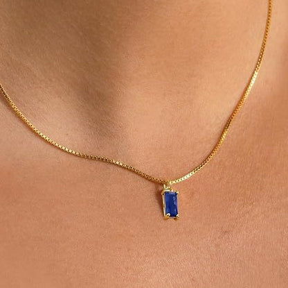 Minimalistische hangerketting met saffier | Witgoud