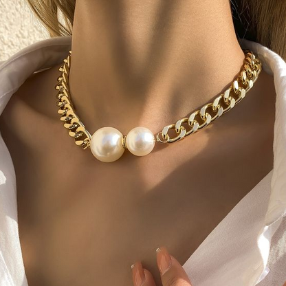 Dubbele schakelketting met madeliefjes in goud