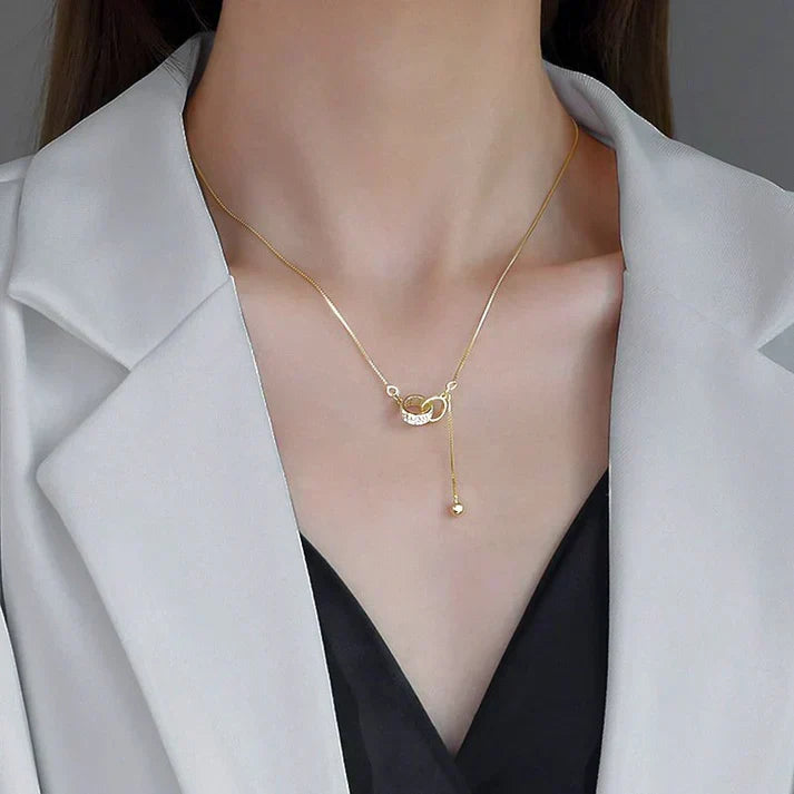 Ketting met twee ringen in goud
