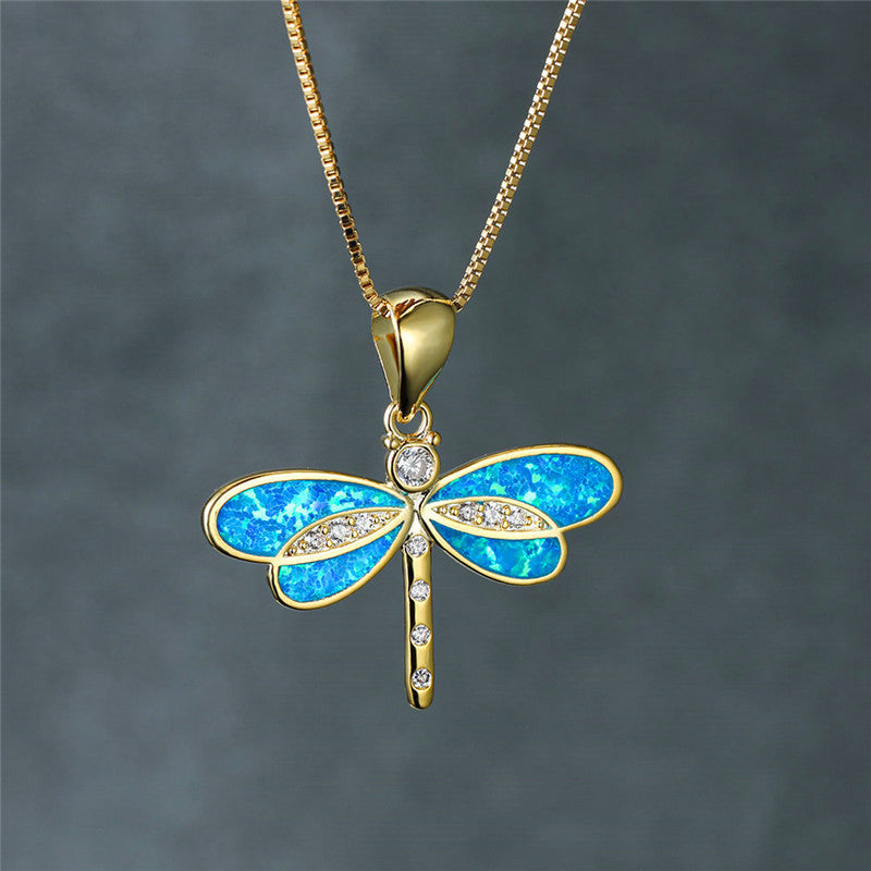 Ketting met libelle en opaal in goud