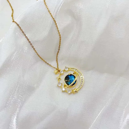 Ketting met planetenmedaillon, sterrenbeelden en ster in goud