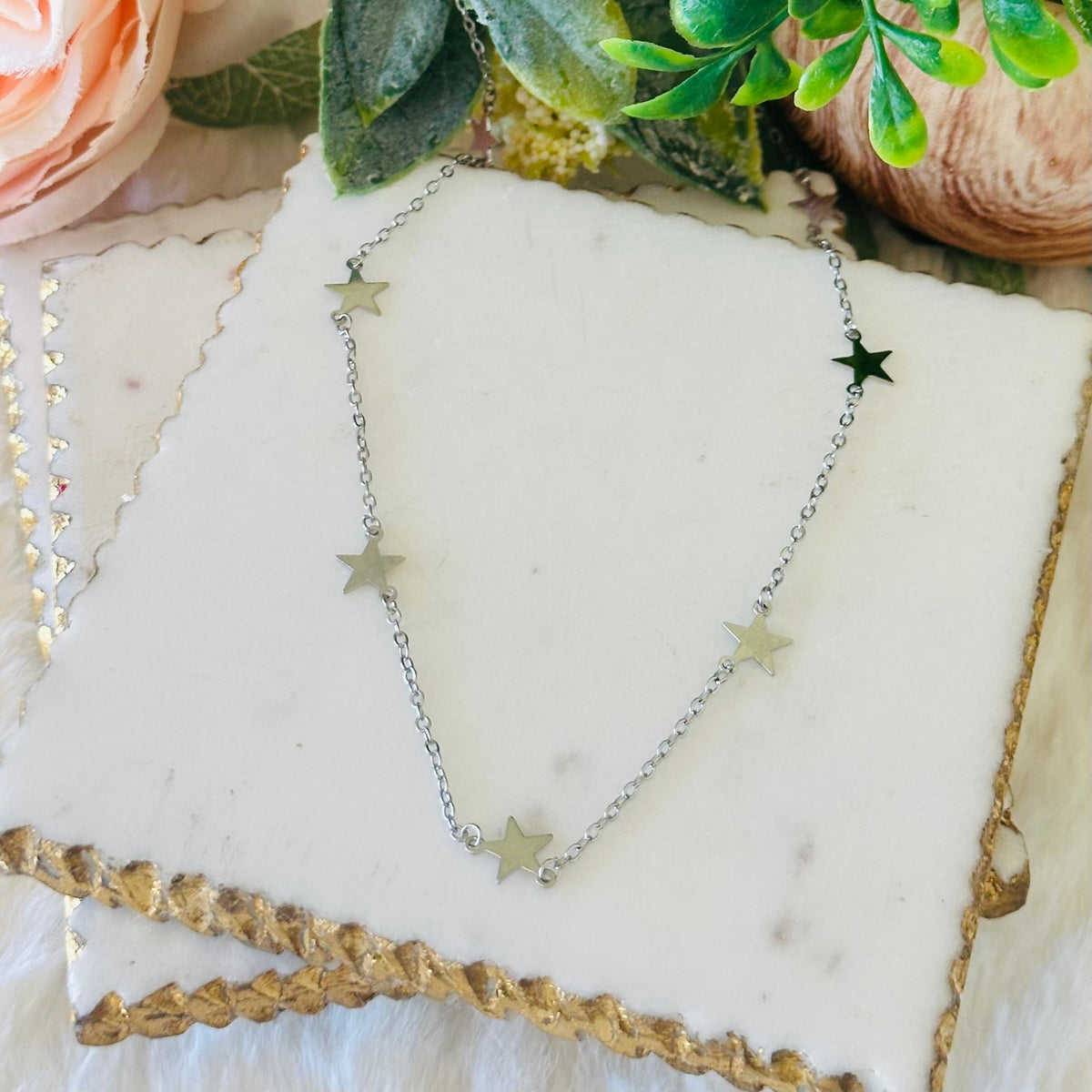 Ketting met fijne sterhanger in goud