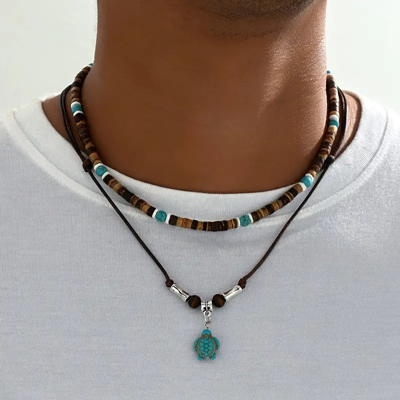 Luxe herenketting met turquoise en tijgeroog-kralen in goud
