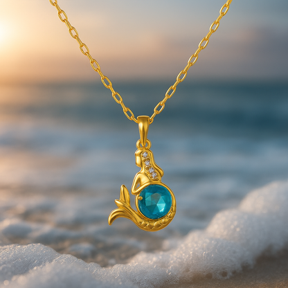 Zeemeerminketting met blauw kristal in goud