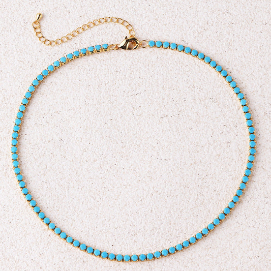 Ronde turquoise tennisketting in goud