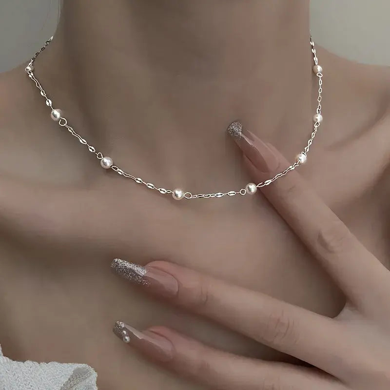 Elegante ketting met glanzende parels in goud