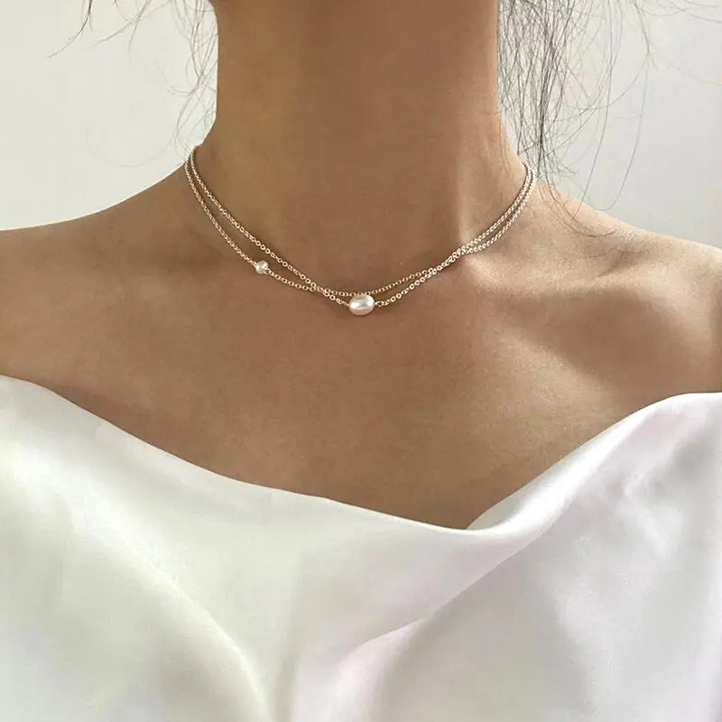 Zoetwaterparelketting in goud